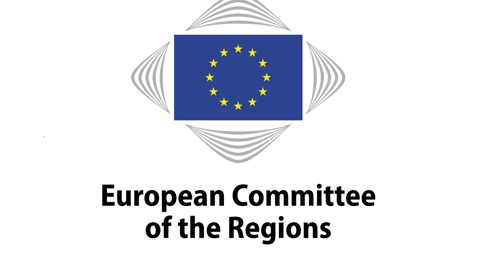 Logo of the European Committee of the Regions featuring an EU flag with yellow stars on a blue background, encased in a stylized diamond shape. Below, the text reads "European Committee of the Regions.