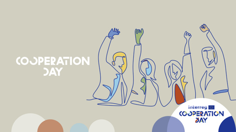 A group of people walk along a city street on a sunny day. Some are wearing shorts and t-shirts, while others have bags or backpacks. The modern glass buildings reflect the bright sky in the background.