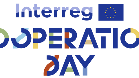 Stylized text reading "Interreg Cooperation Day" with the European Union flag symbol in the design. The letters are multicolored, featuring shades of blue, green, orange, and yellow.