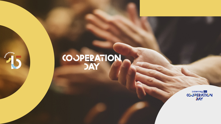Close-up of hands clapping, with text reading "Cooperation Day." The background has soft yellow graphic elements and a "15th Anniversary" logo, along with the Interreg Cooperation Day logo.