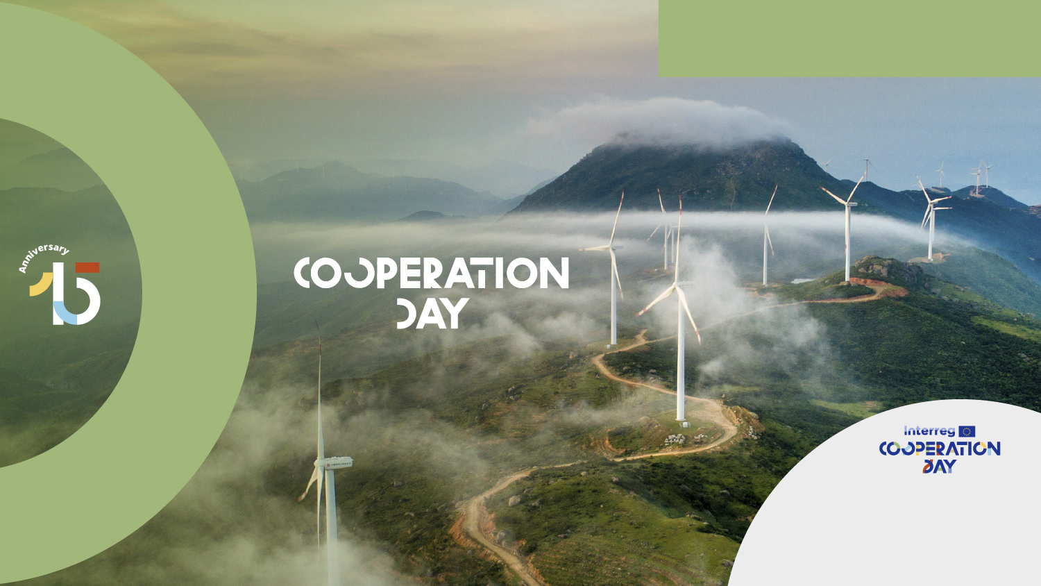 A mountain landscape with wind turbines shrouded in mist, overlaid with text reading “Cooperation Day” and a 15th-anniversary logo for Interreg Cooperation Day.