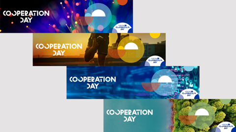 Four colorful banners reading "Cooperation Day" with abstract designs: lights, a runner at sunset, digital patterns, and an aerial view of green trees. Each banner features circular graphic elements.